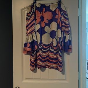 Over the shoulder dress or long top. Never worn. Purchased at a boutique.